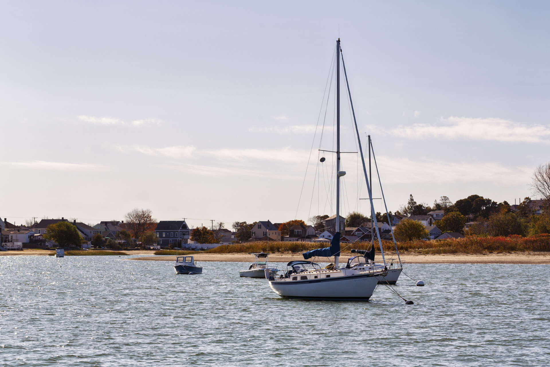 Sailboats moored along the Massachusetts shore, near Watertown and Greater Boston